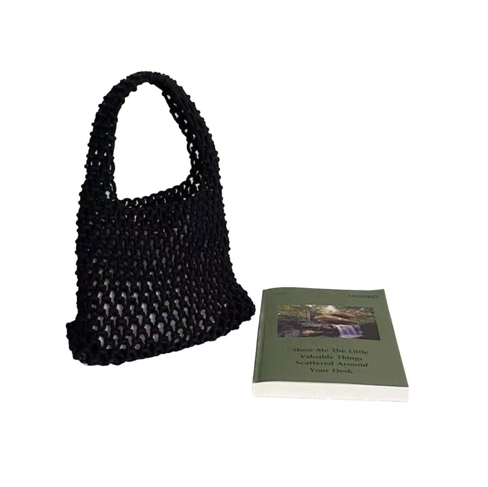 New hand-woven hollow handbag Fashion all-match net pocket holiday beach bag Wrist hollow mesh women's bag hand picked